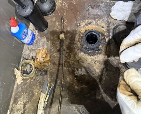 Plumber Performing Drain Cleaning Portland Or